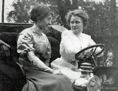 Two beautiful young ladies discussing their sparkplugs