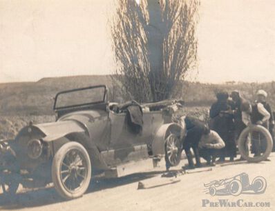A common problem in those days; a flat tyre.