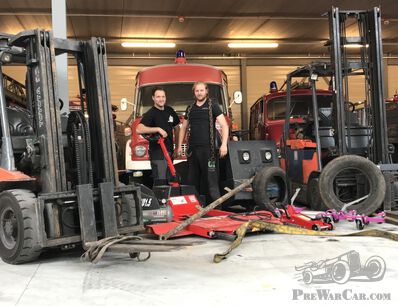 Preparations for an auction of 300 vehicles.