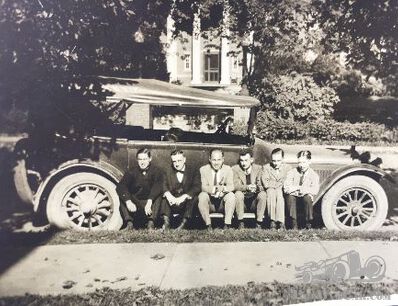 6 chaps on a running-board