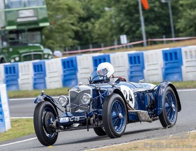 1935 Riley TT Sprite in action during the Brooklands Double Twelve Motorsport Festival