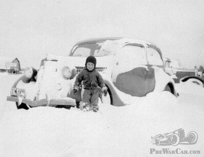 A July snowstorm covers this PreWarCar