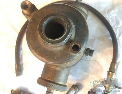 Identifying the make/model of the 2 carbs