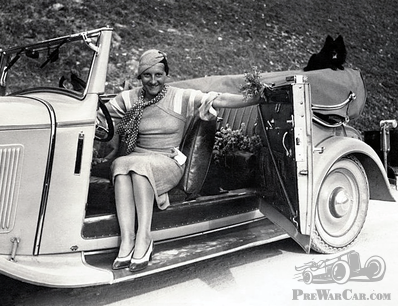 Fashionable Friday lady in modish mystery motor