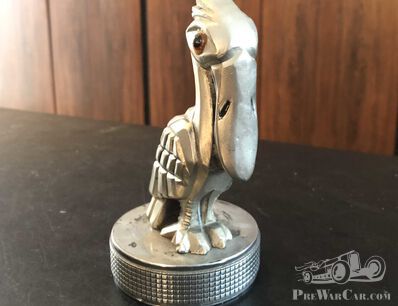 A rather special mascot in Art Deco style