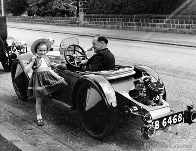 Lone driver with low, coffin-shaped projectile