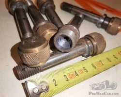 6 unidentified new old stock engine parts