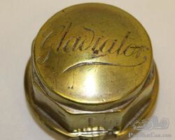 Gladiator Automobile Brass Threaded Hubcap | Check the Oil Auction | Ending January 16, 2022