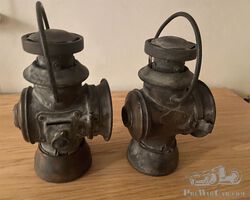 Matching pair of Howes and Burley kerosene side lamps
