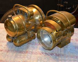 2 selfgenerating brass-lamps