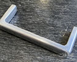 Aluminum grab / pull handle.