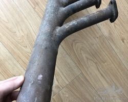 Collecteur d'échappement ancien