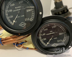 Fully restored Aric oil and water temperature gauges.