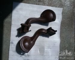 Pair of heavy sidemounts for spare wheels of circa 1933 Packard