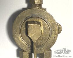 Brass fuel selector tap.