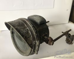 Miller motorbike headlamp and vintage acetylene carbide generator