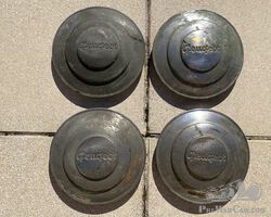 4 Peugeot 302 / 402 hubcaps