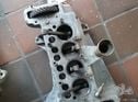 Austin Seven crankcase with crankshaft , conn rods , flywheel and crankhandle neck