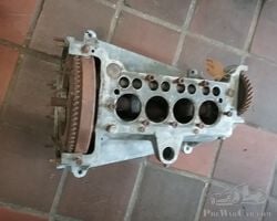 Austin Seven crankcase with crankshaft and camshaft plus flywheel with starterdisc