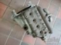 Austin Seven engine with manifolds, flywheel, head and oilpipe