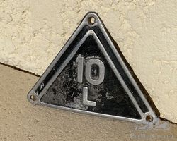 Citroen Rosalie 10L rear fender badge