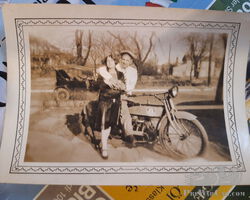 unknown motorcycle and car