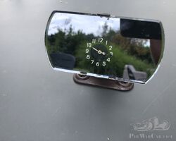 original mirror with clock and interior lighting