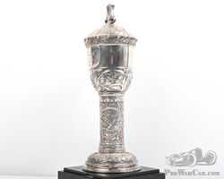 An important French silver lidded trophy cup awarded to the famous Grand Prix Bugatti driver Elisabeth Junek | Donington Auctions
