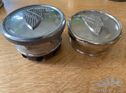 Two hubcaps for the 1920s Oaklands