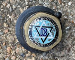 Dodge Four Spare Wheel Carrier with Enamelled Badge