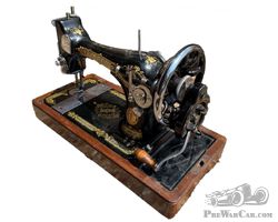 https://www.silverstoneauctions.com/sa088-lot-21053-antique-circa-1920s-crank-handle-singer-sewing-machine-in-box?pn=1&el=21053&pp=100