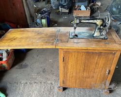 Singer Sewing Machine in Cabinet