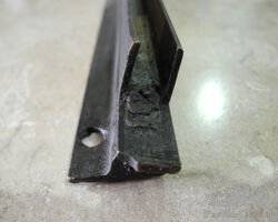 Windscreen top rail