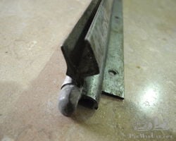 Windscreen top rail