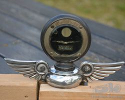 Original Studebaker radiator lock with motometer .