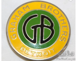 1920's Graham Brothers Yellow and Green Radiator Emblem Badge
