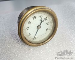 unidentified brass pressure gauge