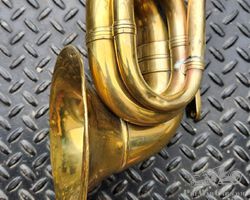 A Large Brass Triple Twist Bulb Horn