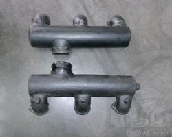 Used exhaust manifolds for a Silver Ghost from around 1923