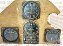 Piece of airplane control panel with 4 instruments