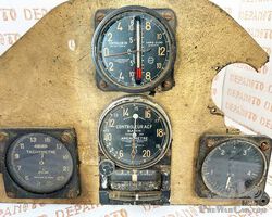 Piece of airplane control panel with 4 instruments