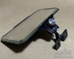 Vintage car windscreen mounted rear view mirror.