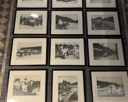 Set of framed racing Bugatti prints.