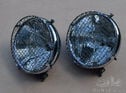 Pair of Marchal 10 inch headlights with stoneguards