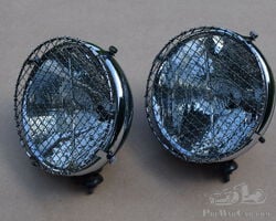 Pair of Marchal 10 inch headlights with stoneguards