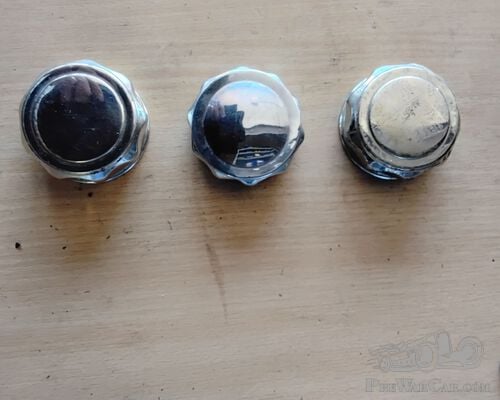 Three new old stock chromed caps for Model A Fords