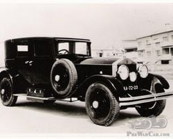 One wheel and two L+R Rolls Royce Silver Ghost doors