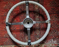 Vintage sprung 4 spoke steering wheel for a variety of British Sports cars or VSCC specials