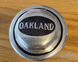 Nickeled hubcap for mid vintage Oakland