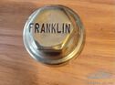 Brass hubcap for a vintage Franklin